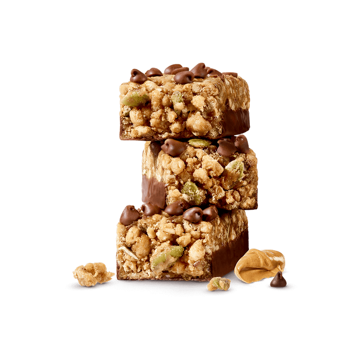 Big 100 Peanut Butter Granola Protein Bar with peanut butter next to it